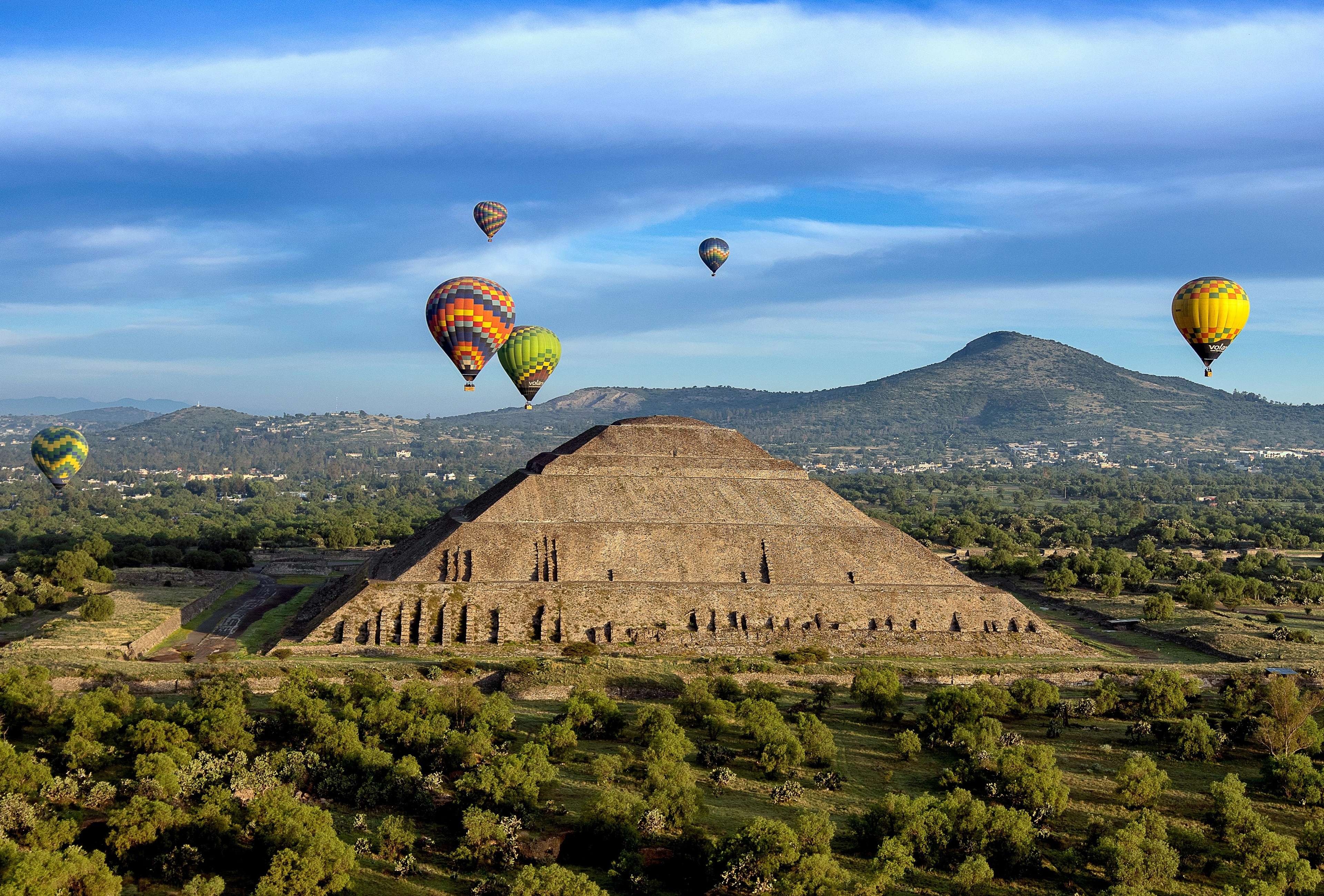 Aerial view of hot air balloons above the Teotihuacan