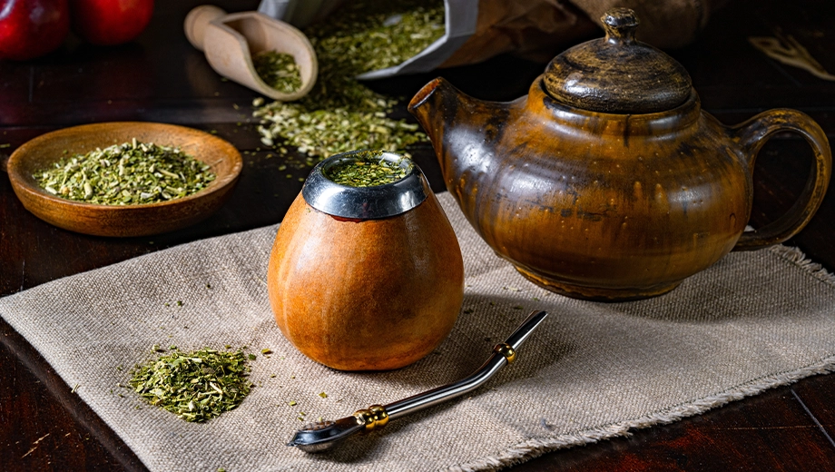 Prepare yerba mate with calabash and bombilla, Paraguay